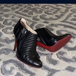 Christian Lou Boutin 