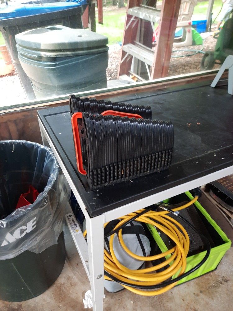 Sidewinder Sewer Hose Holder