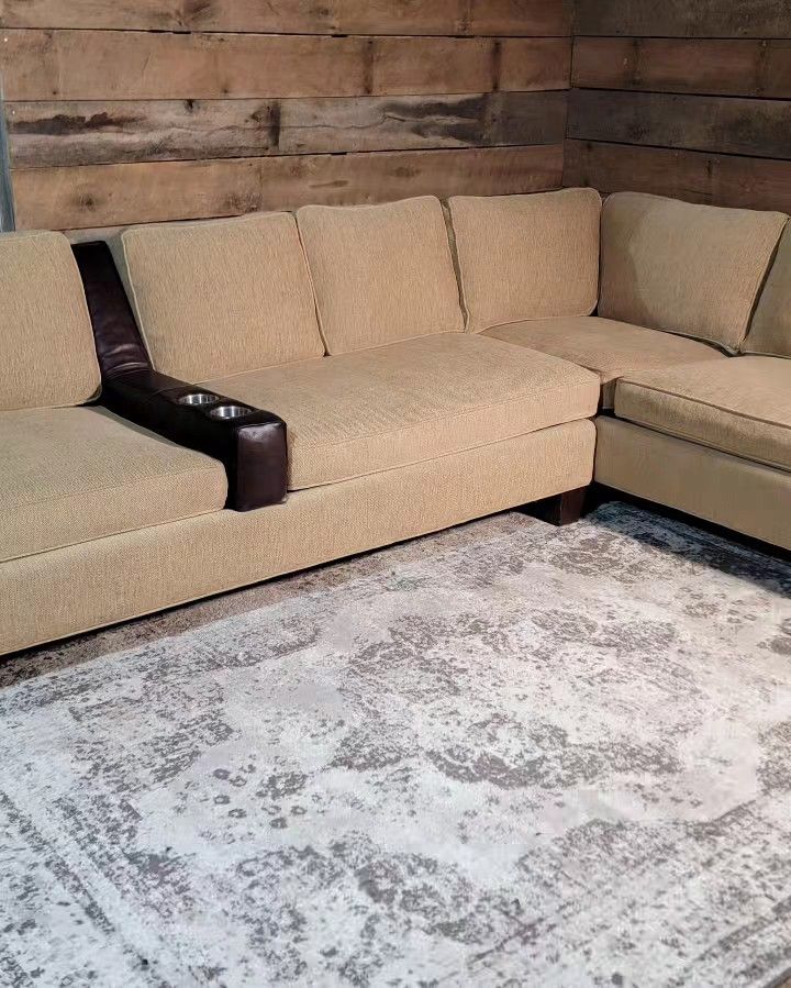 Vintage feather/down sectional with custom-built leather drink holder