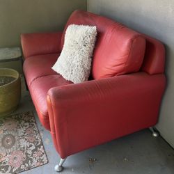 Red Leather (faux I believe) Loveseat 