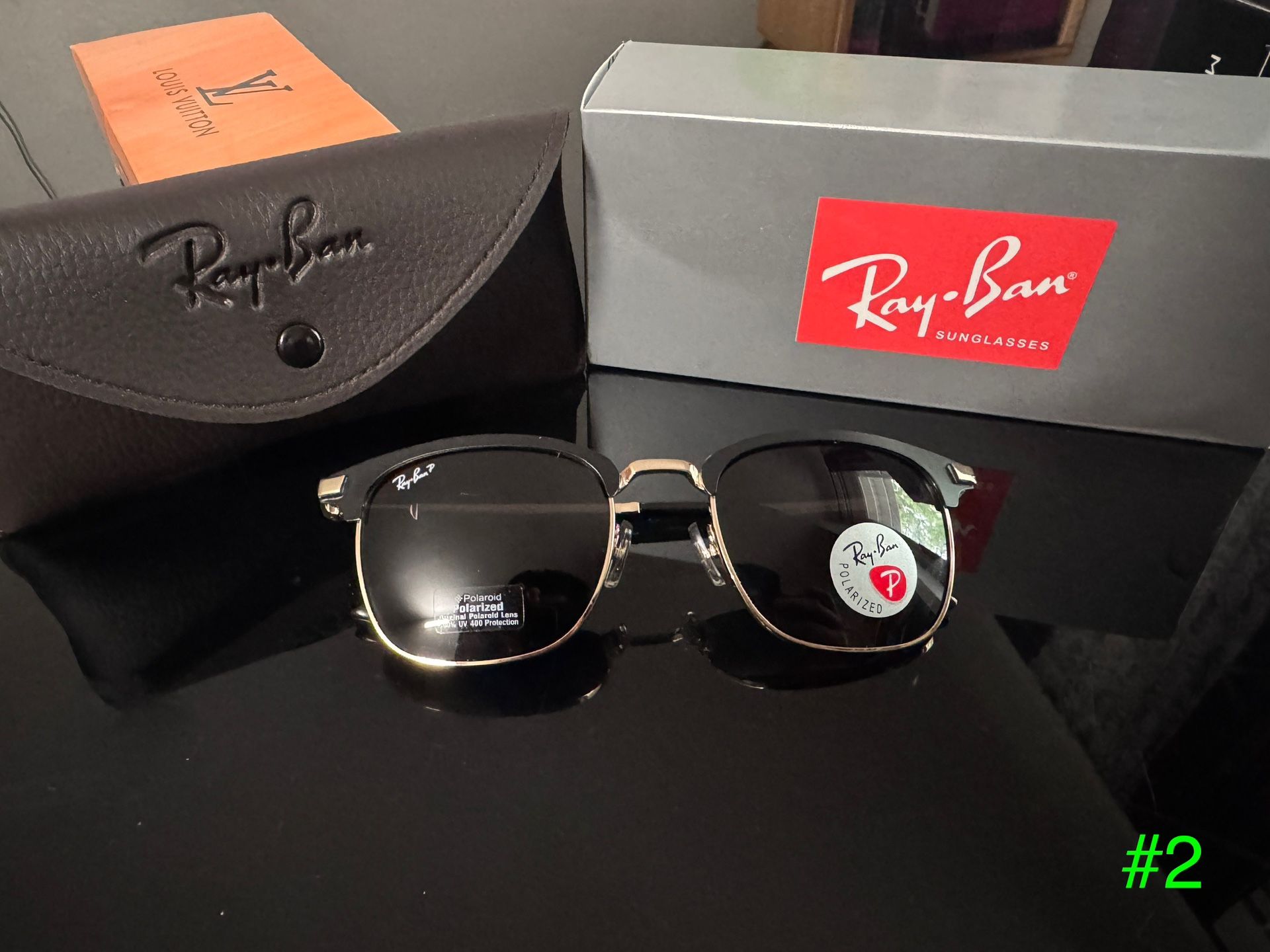 Ray-Ban Sleek Black and Gold Sunglasses