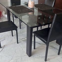 Glass Table with 4 Chairs,  72”  x  42”