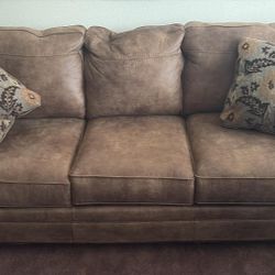 Beige Faux Couch w/Hide A Bed