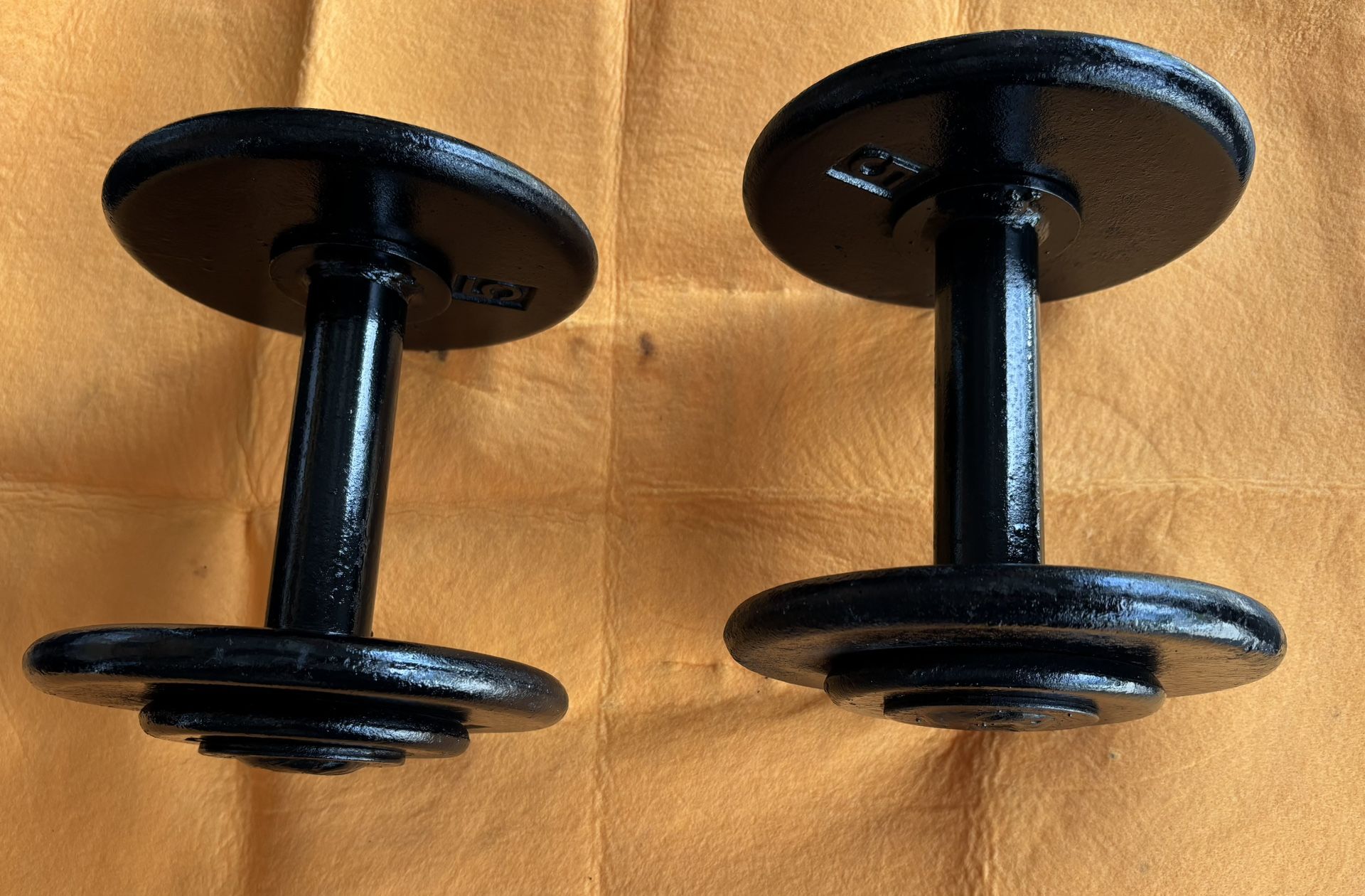 Two 20 Pound dumbbells weights $0.80 per pound 
