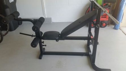 Biodyne weight bench with weights and attachments for Sale in Orlando FL OfferUp