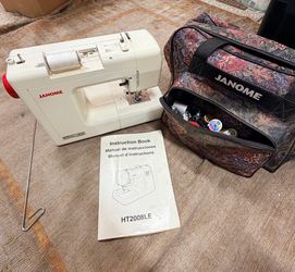 Janome used sewing machine w/bag supplies