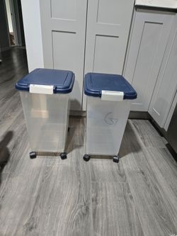 Two pet food bins on wheels