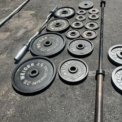 Olympic weight set with barbell and curl bar