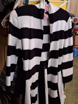 Medium size sweater by Saint John Bay never been used!