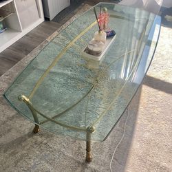 Glass coffee table with gold frame