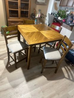 High top table with 4 chairs