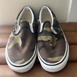 Vans Classic Slip-On sneakers in a "Woodland Camo" colorway