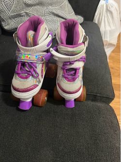 Girls Pink, White and Purple Skates
