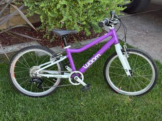 Woom 4 20 inch 7 speed  kids bike  all aluminum