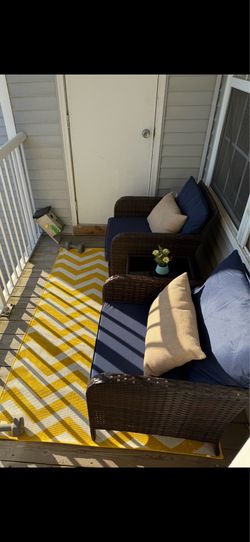 Outdoor patio set with foot rests - 1 year old