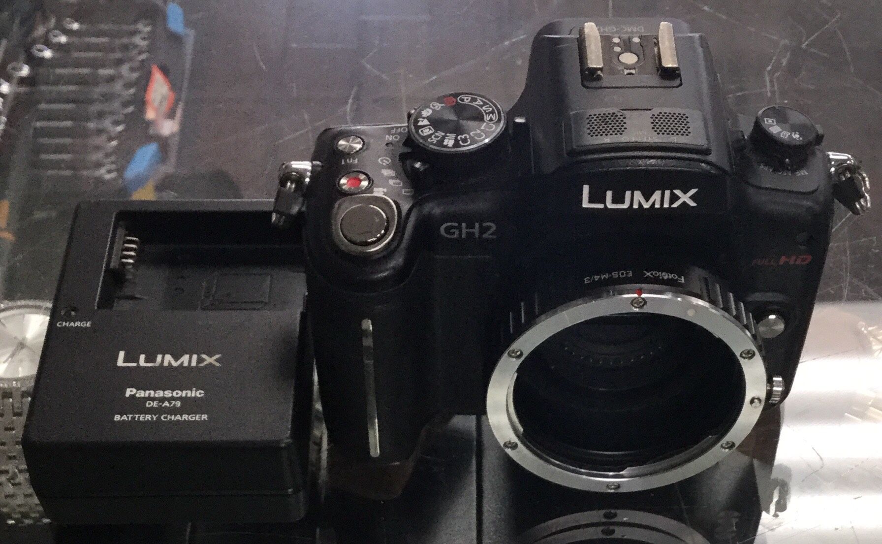 Panasonic lumix 16mp digital camera body only w/ canon lens adapter
