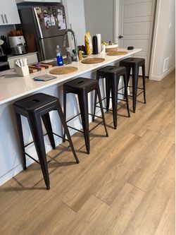 Dark brown metal stools (4)