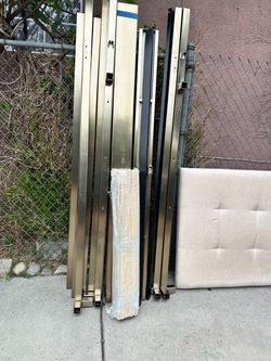 Upholstered Bed Frame with Metal Rails – Disassembled