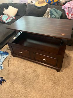 Coffee table with lift top