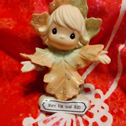Precious moments leaf Figurine 