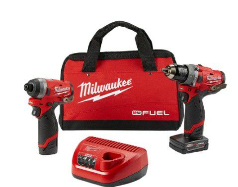Milwaukee Hammer drill and impact gun kit with batteries and charger