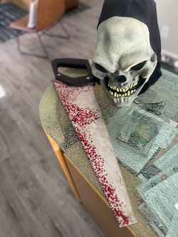 Halloween Skull Mask and Bloody Saw Prop Set