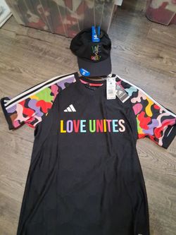 New with tags , Love Unites soccer jersey and hat set..  yes they're available