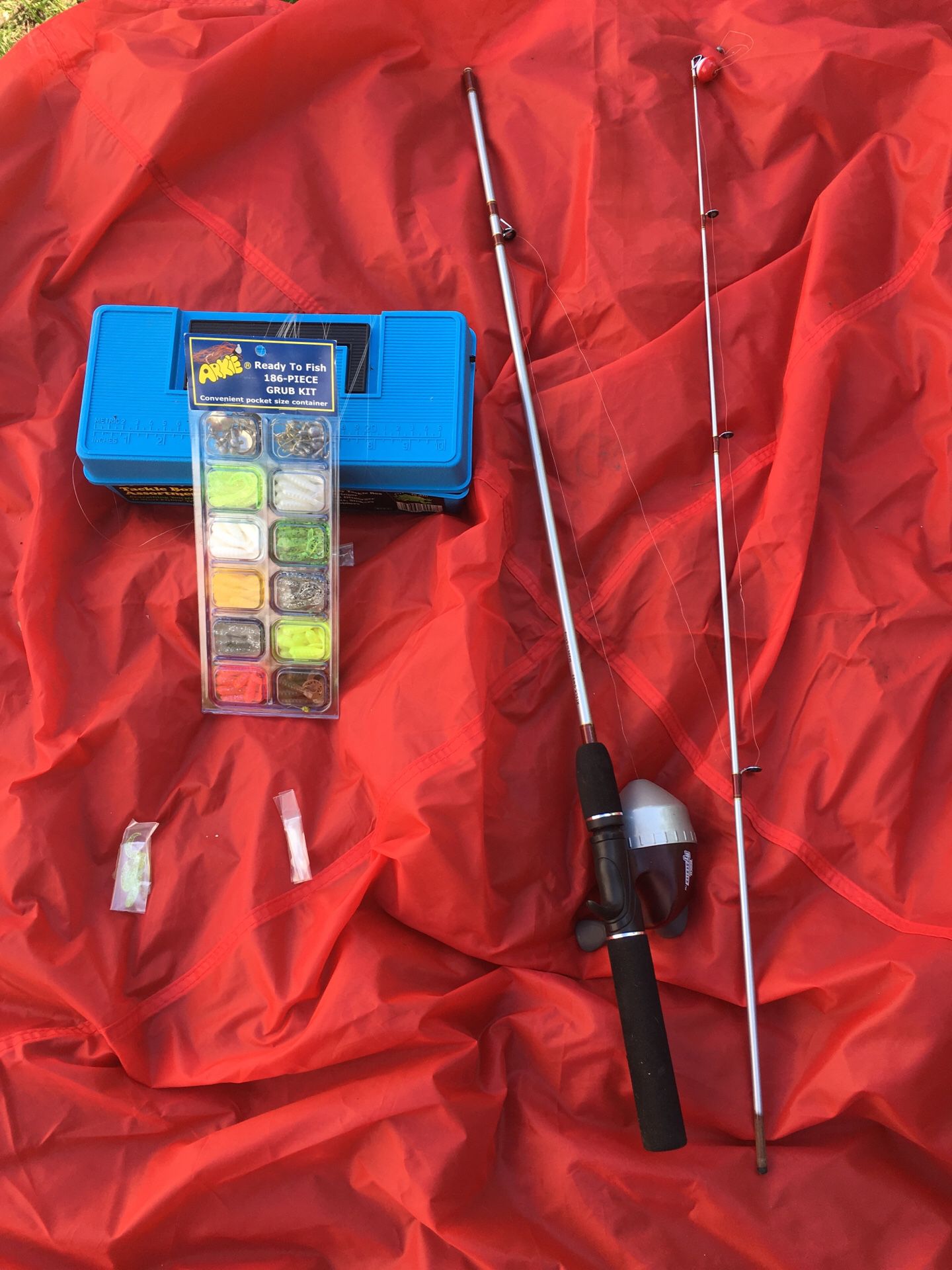 Push button fishing pole, with tackle box and lures