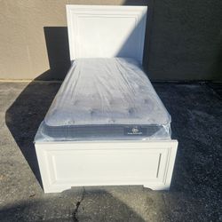 White Twin Size Solid Wood Bed Frame With Brand New Twin Size Plush Serta Mattress And Box Spring In Plastic 