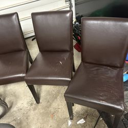 3 Faux Leather Dining Chairs. 