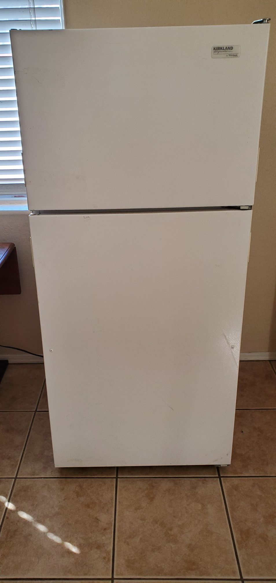 Refrigerator freezer fridge garage fridge beer fridge storage fridge Kirkland signature by whirlpool priced to sell