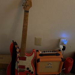 Electric Guitar And 12  (1X6) Watt Orange Amp