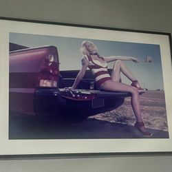 American Girl Sitting On Tailgate 