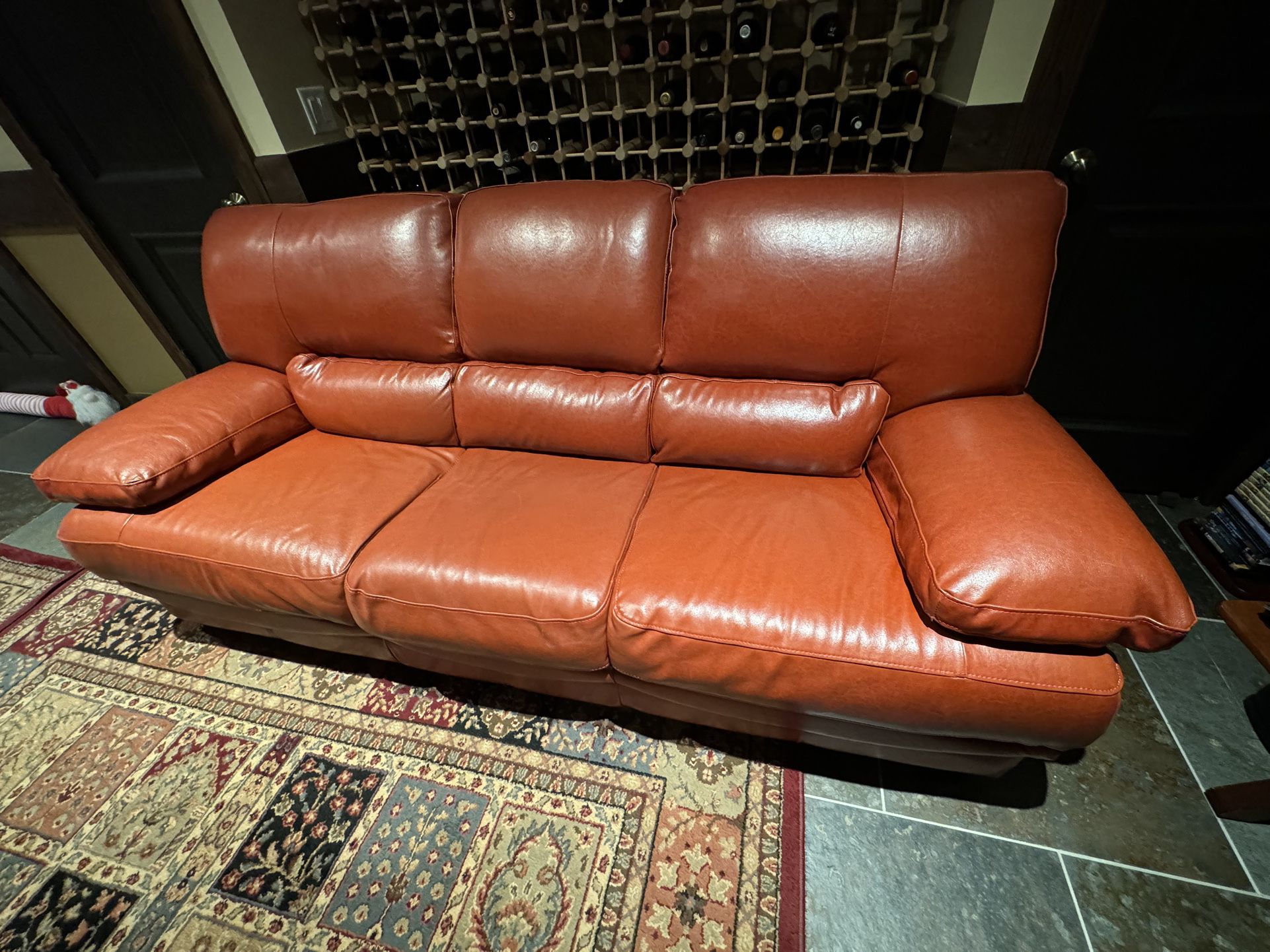 Authentic Leather Couches, Red Color , Good Condition.