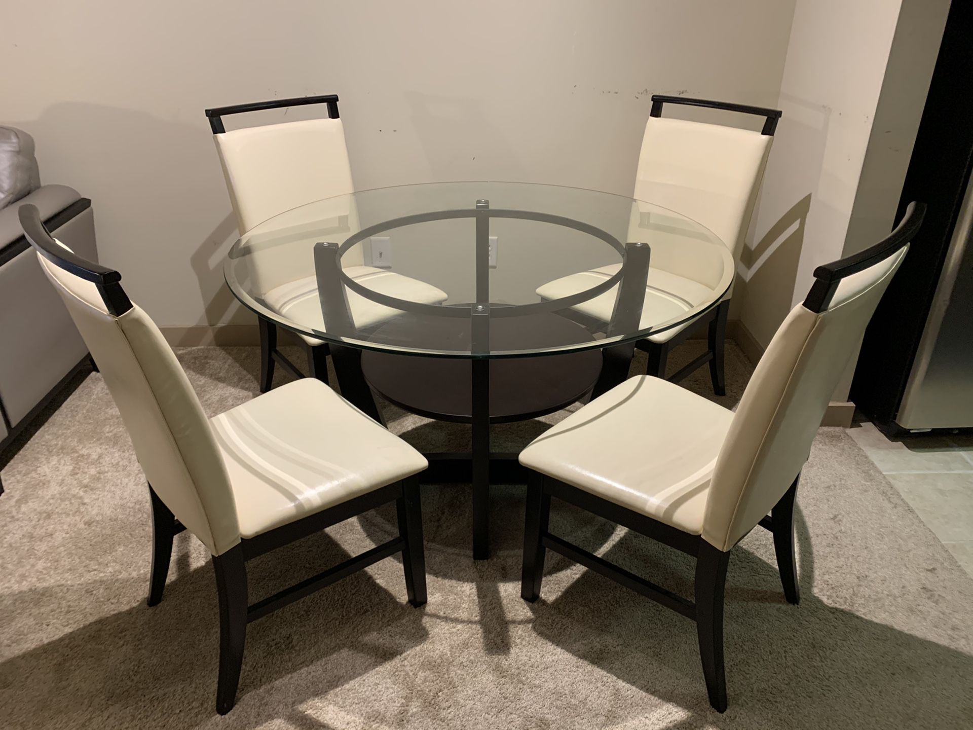 Glass Top Dining Table with Wooden Base and 4 Cream Leather Chairs