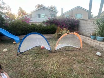 Two pop up youth soccer goals