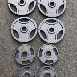 Olympic Style Weights 2inches With A 7ft Barbell. BRAND NEW