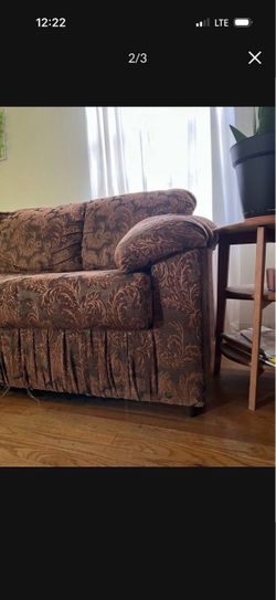 Large Floral design Fabric  Upholstered Sofa Send best offer for Brown large couch. In good condition. It is pretty LARGE size. Must pick up with spac