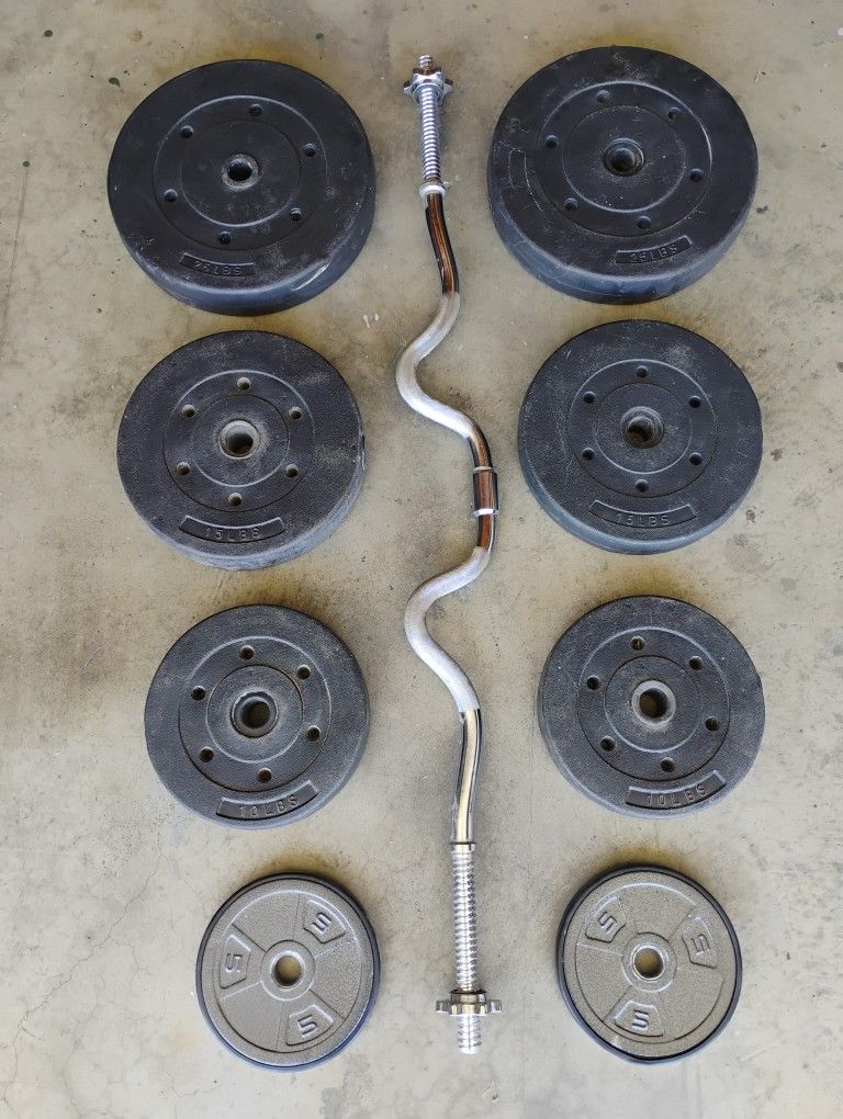 Curl Bar and 110 Lbs of Vinyl Weights