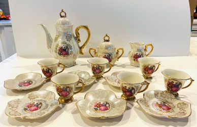 vintage porcelain tea service set from Japan features an iridescent finish with a "courting couple" Victorian scene. Step into a romantic, old-world