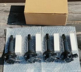 High performance ignition coils & spark plugs For most  four cylinder engines a couple of Mazda cars brand new 30$