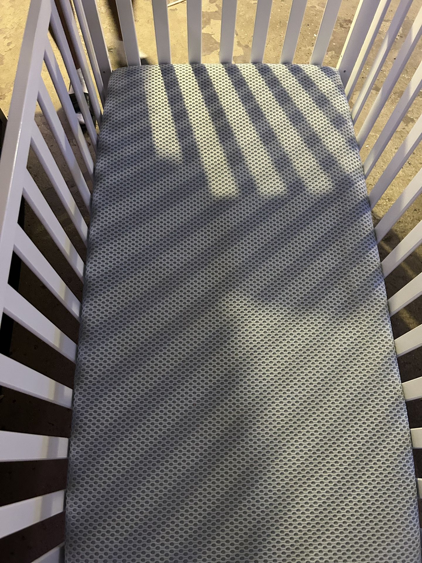 baby crib and mattress