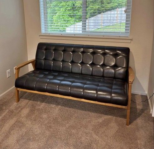 Like New Faux Leather Sofa
