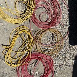 2 Extension Cords And 3 Air Hoses
