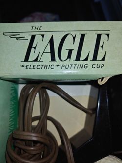 Golf assistant putting cup