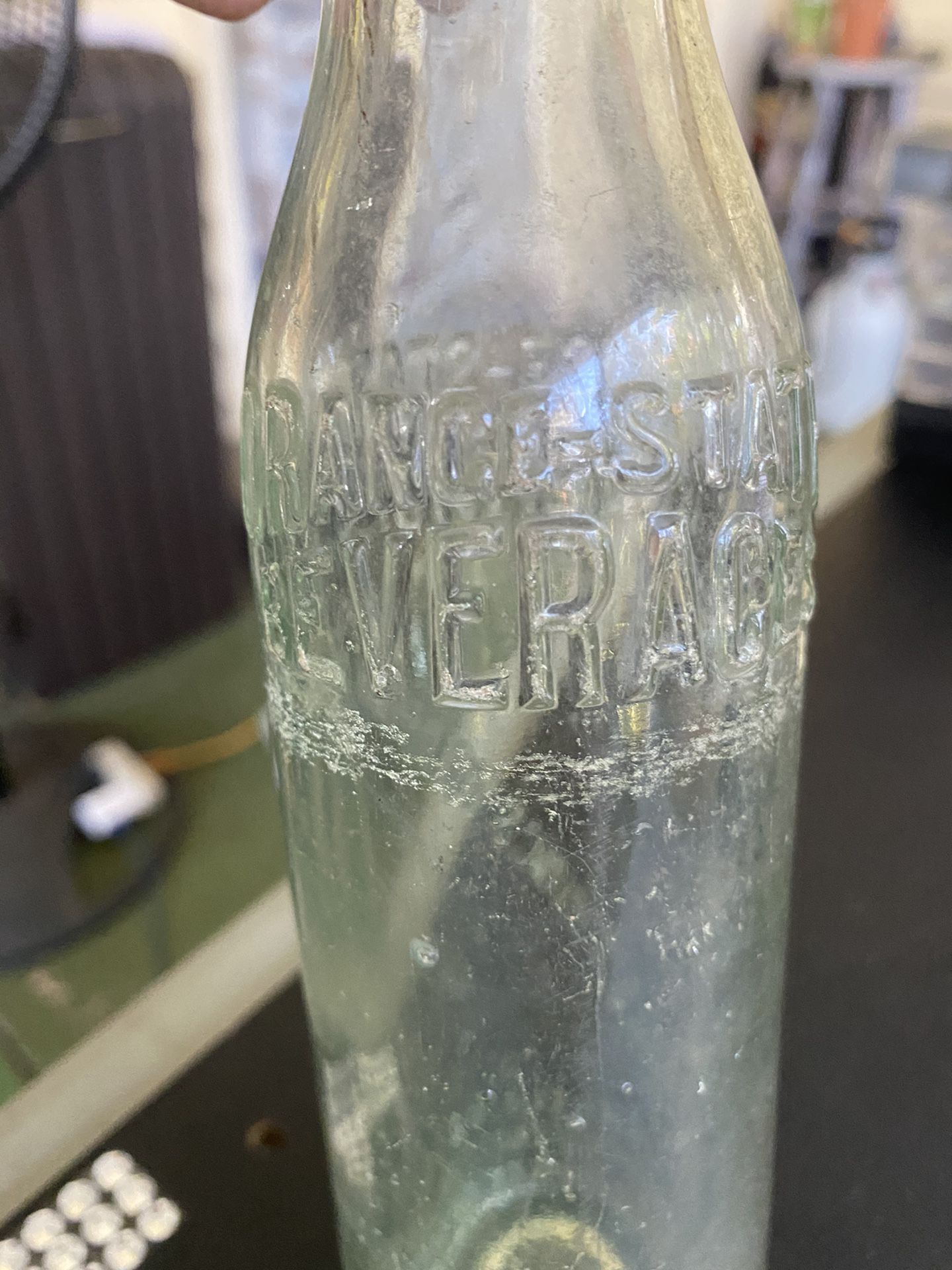 Antique bottle: Orange State Beverage Co. 6.5 ounce bottle. Made in Bradentown ( now named Bradenton ) Fl. Made prior to name change which took place 