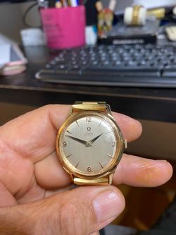 À vintage omega bumper watch 18 k solid