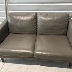 Kasala Grey Leather Love Seat
