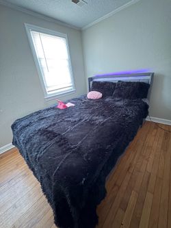 Bed frame with draws at bottom
