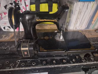Antique singer sewing machine 221